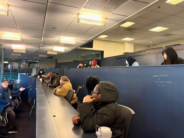 🏟️ Behind the Scenes
Students in Mr. Djordjevic's hospitality and tourism class listen to a presentation in the press box at American Family Field in Milwaukee, Wisconsin, during a tour on Nov. 8. The class received a behind-the-scenes look at the operations of the stadium, home of the Milwaukee Brewers.