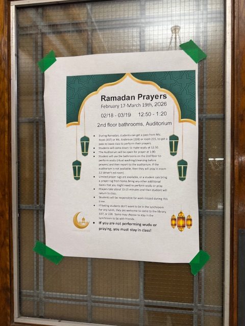 Posters hang in the halls of Bay View High School announcing to students the locations for prayer and alternate spaces to go during lunch in observance of the Muslim Holy Month of Ramadan. 